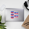 Haiti Flag stickers designed on the back of a gray laptop spelling HOME and PROUD.