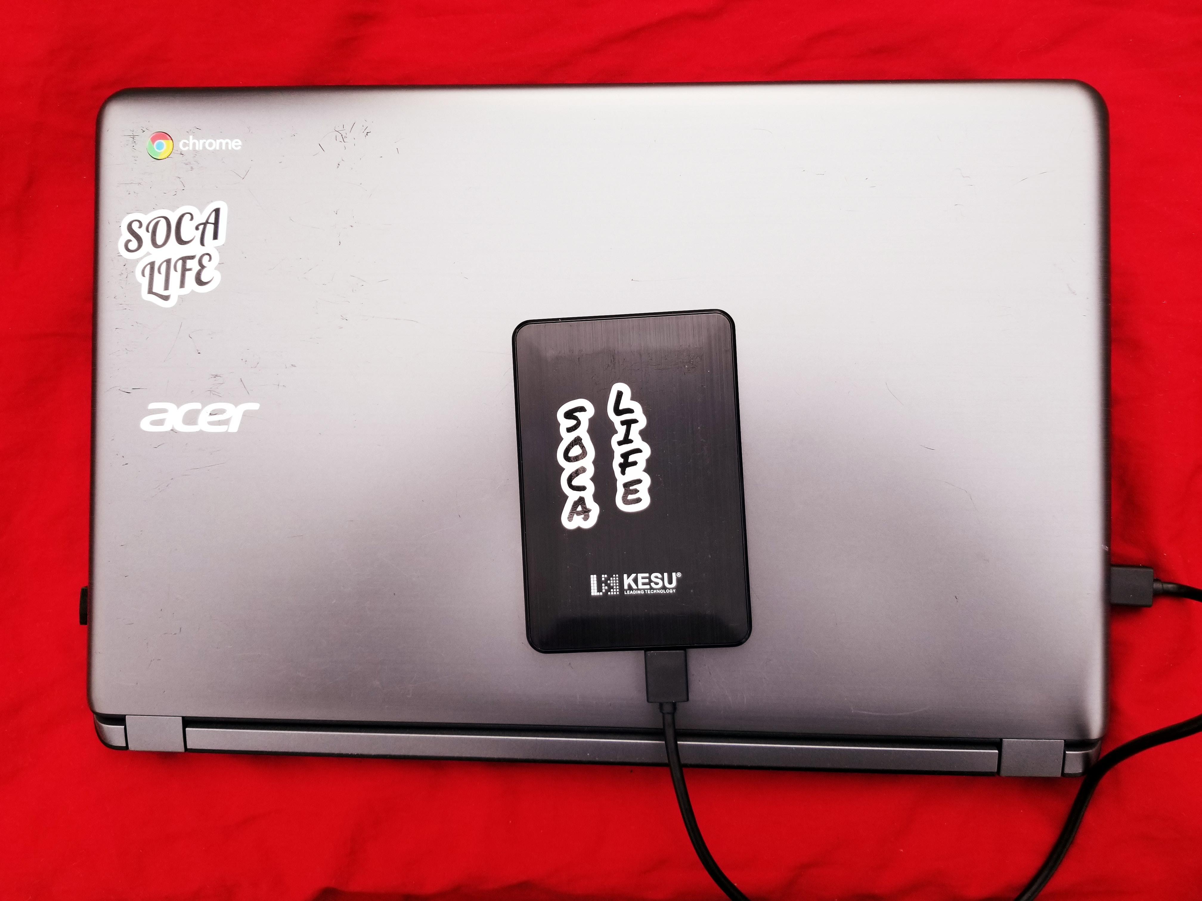 soca life sticker on laptop