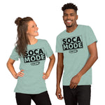 A black man and white woman wearing prism dusty blue color shirts that says Soca Mode in black print on the front.