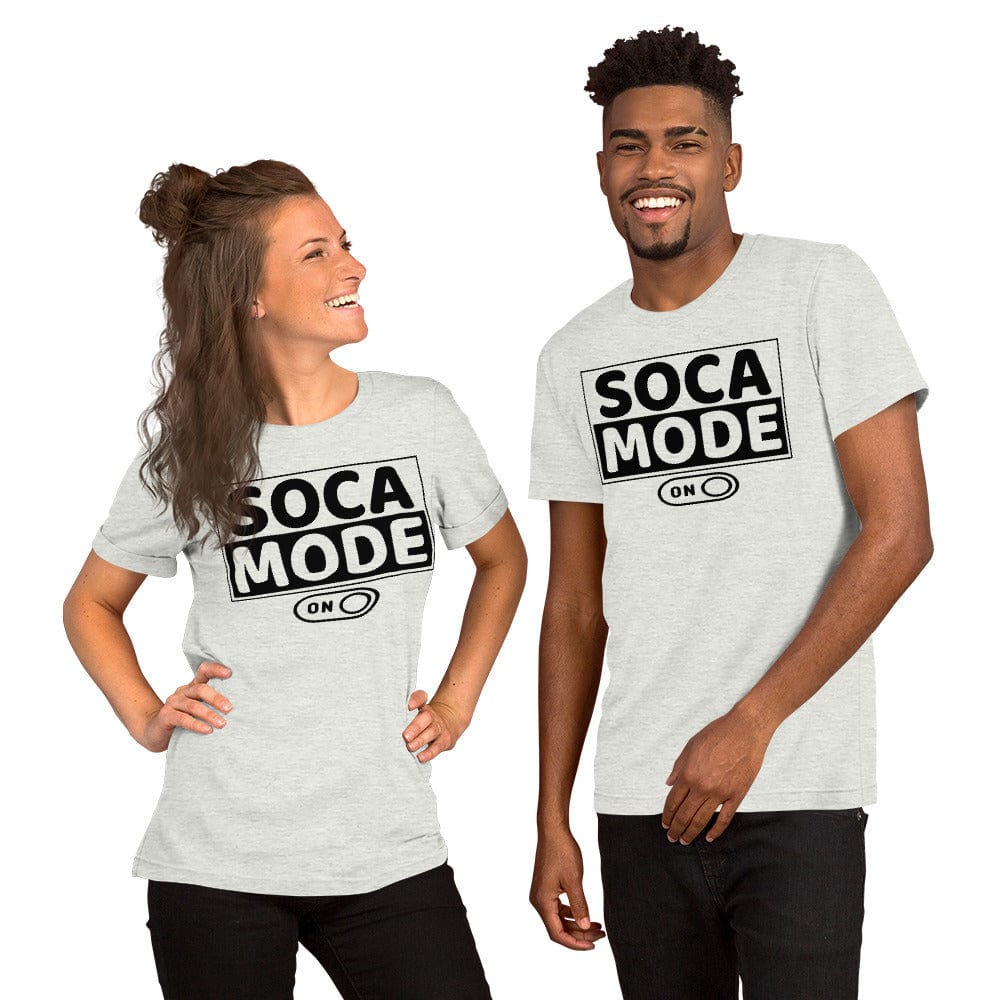 A black man and a white woman wearing ash color shirts that says Soca Mode in black print on the front.