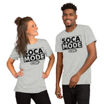 A black man and a white woman wearing athletic heather color shirts that says Soca Mode in black print on the front.