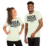 A black man and a white woman wearing citron color shirts that says Soca Mode in black print on the front.