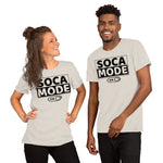 A black man and a white woman wearing heather dust color shirts that says Soca Mode in black print on the front.
