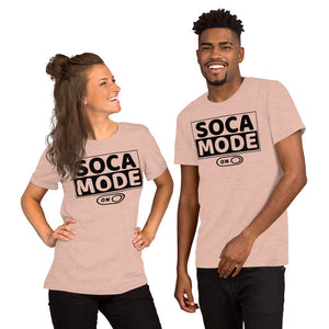 A black man and a white woman wearing heather prism peach color shirts that says Soca Mode in black print on the front.