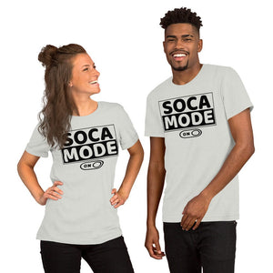 A black man and a white woman wearing silver color shirts that says Soca Mode in black print on the front.