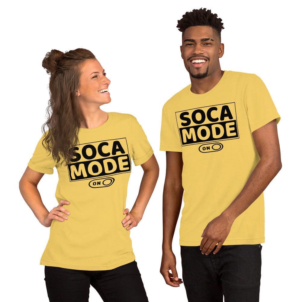 A black man and a white woman wearing yellow color shirts that says Soca Mode in black print on the front.